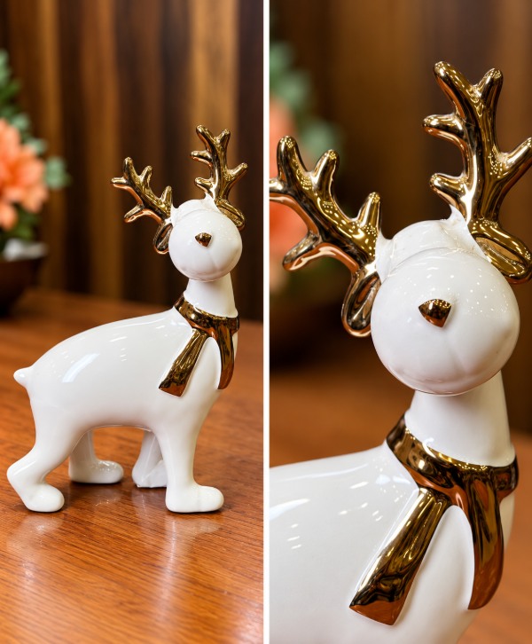 Glossy White Ceramic Reindeer  with Golden Horns and Decorative Scarf – Elegant Home Décor Statue